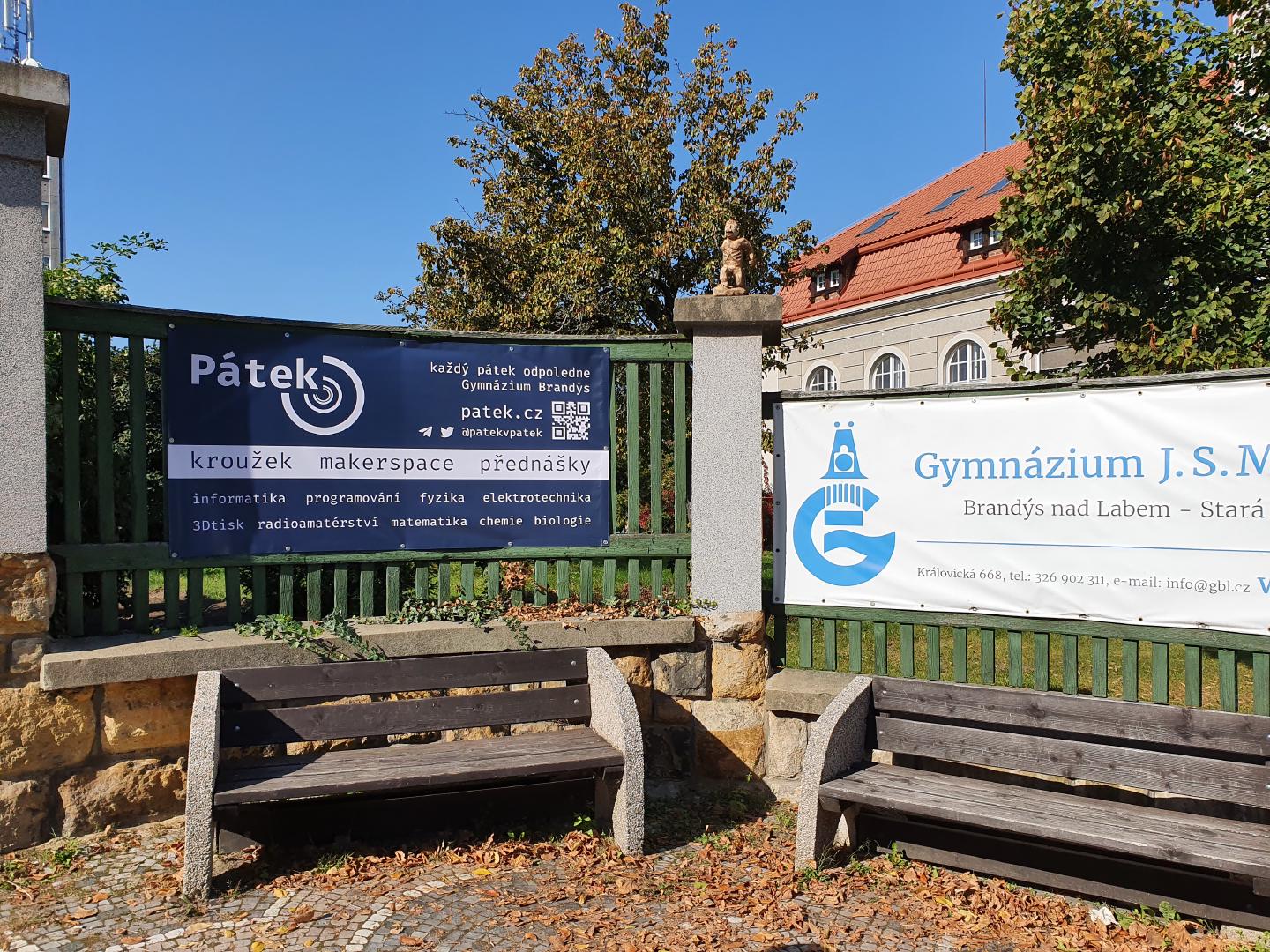 Pátek's banner on our school's fence